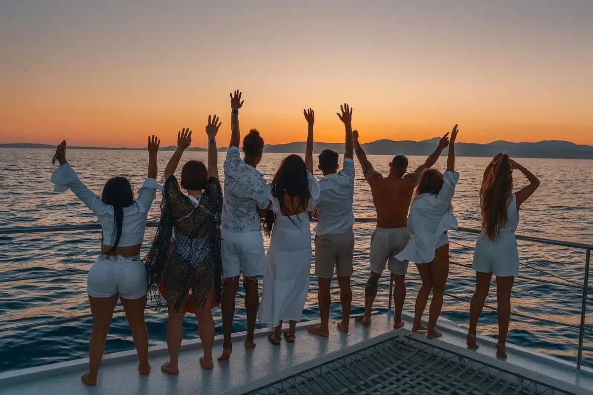 Travelers enjoying a boat trip at sunset
