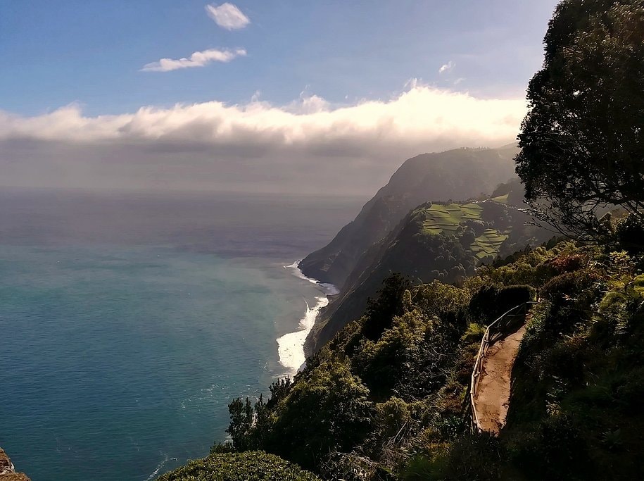 Dramatic sea cliffs and a coastal trail overlooking the Atlantic on Nordeste's rugged coastline